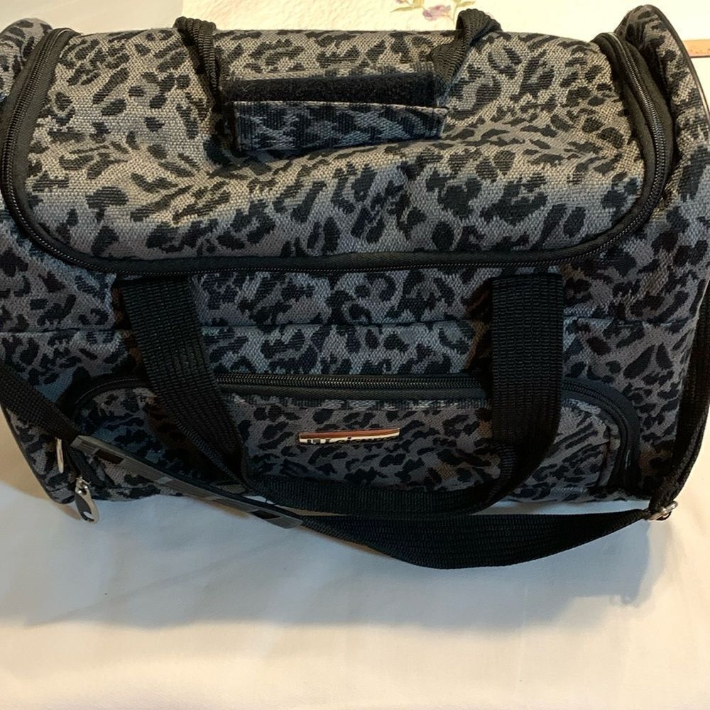 LEISURE travel satchel/shoulder bag. Black and gray animal print